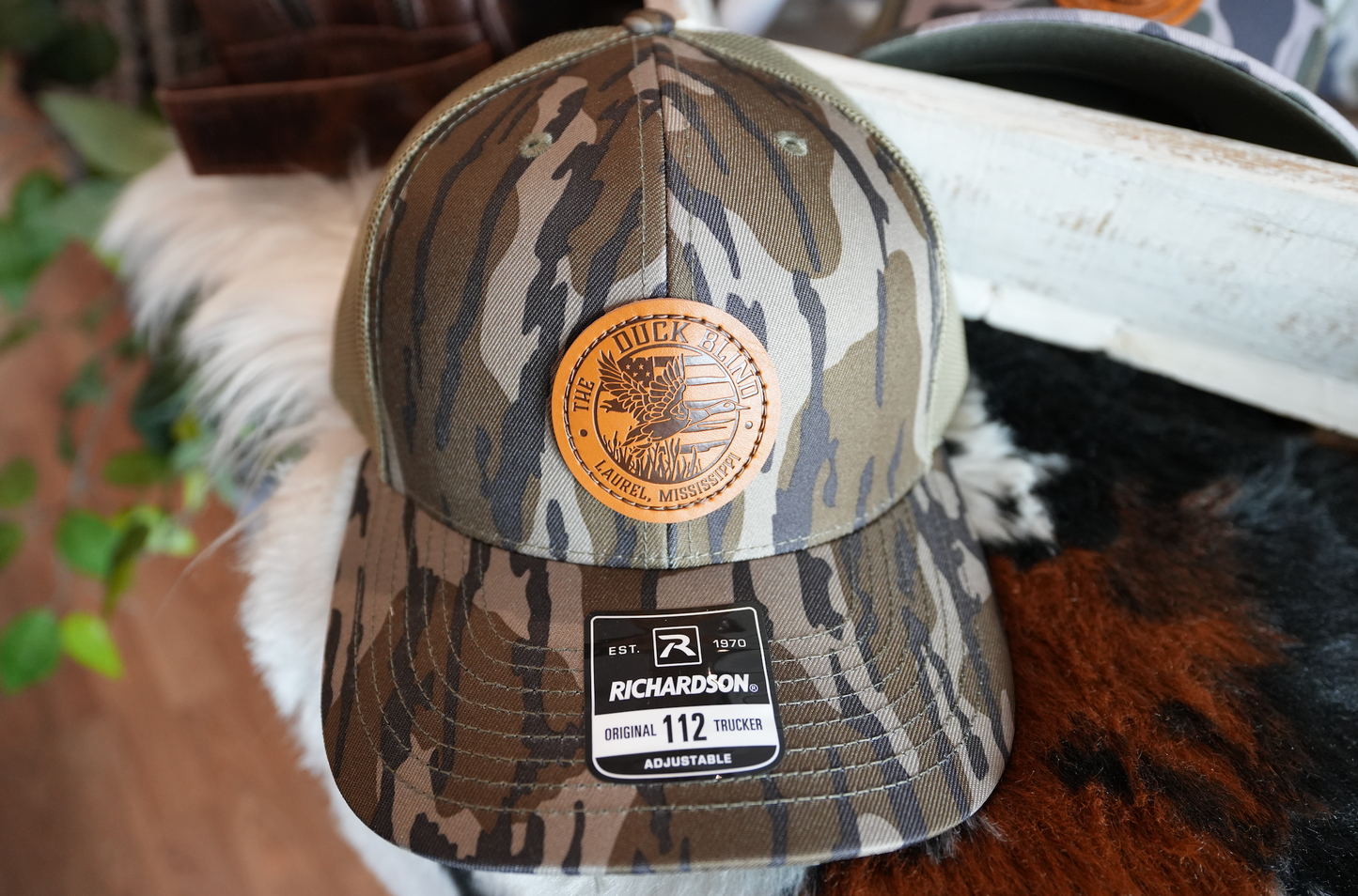 The Duck Blind Bottomland Camo Logo Patch Hat darker